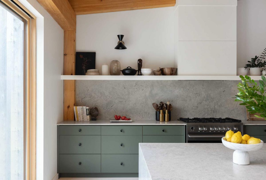 Beautiful custom dark green white oak kitchen with black hardware, and white range hood and shelf. - Puslinch Ontario