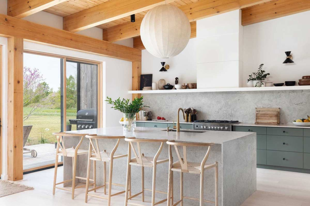 Beautiful custom dark green white oak kitchen with black hardware, and white range hood and shelf. - Aberfoyle Ontario