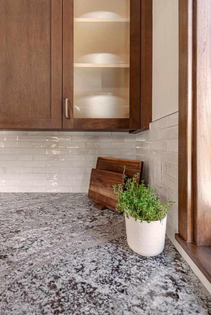 Beautiful maple kitchen with reeded glass display cabinets, undercounter lighting and lots of personality. - Georgetown, Ontario
